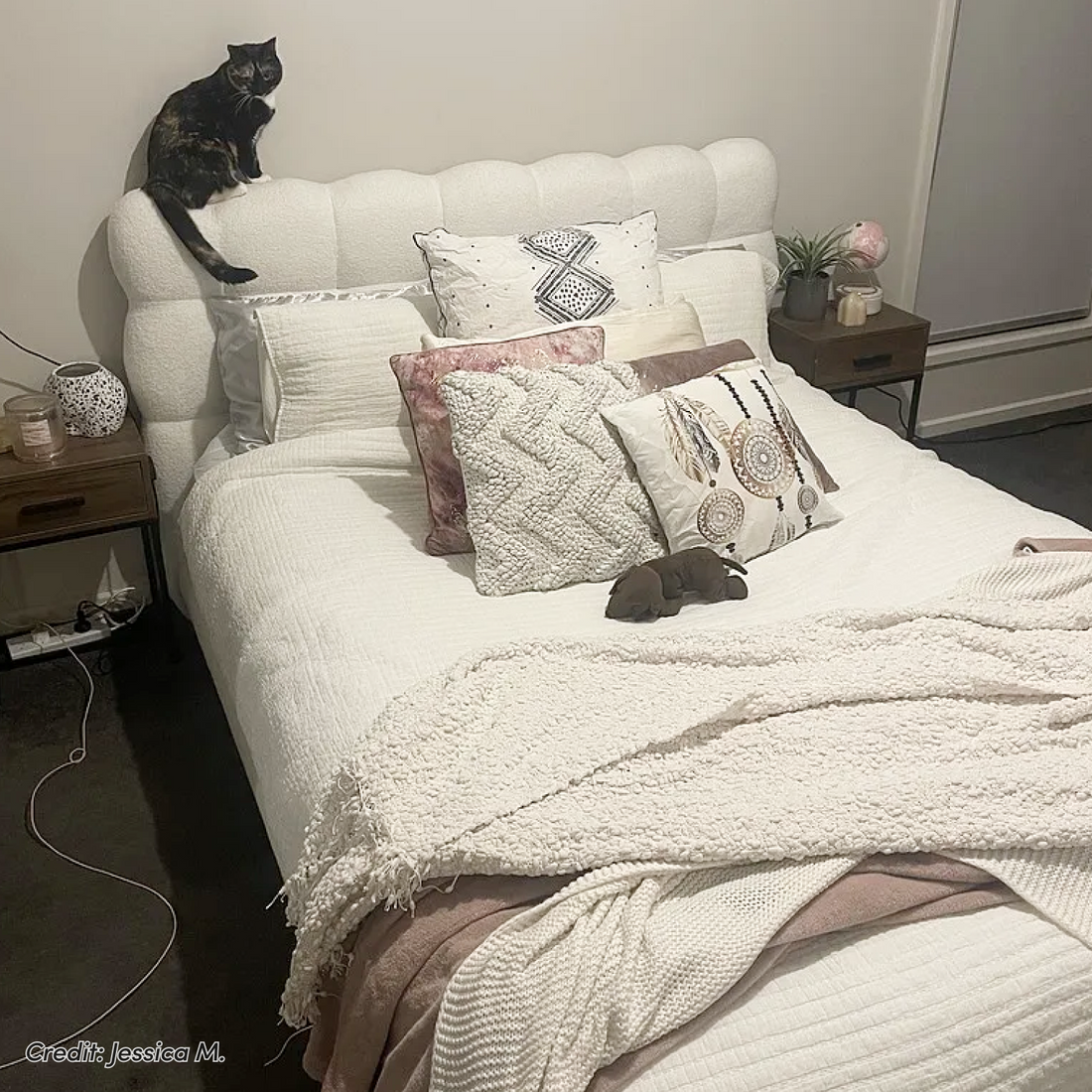 Aina King Boucle Bed Frame in Cream White with scalloped tufted headboard, styled with white bedding and textured cushions