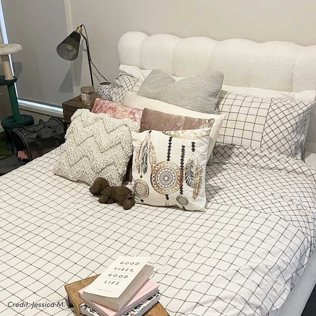 Aina King Boucle Bed Frame in Cream White with scalloped tufted headboard and grid-patterned bedding