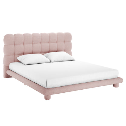 Aina Boucle King Bed Frame in pink with textured upholstery, padded scalloped headboard, and white bedding