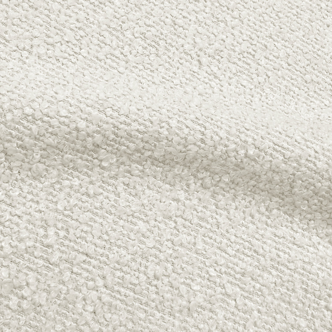 Close-up of cream white boucle fabric texture with woven pattern