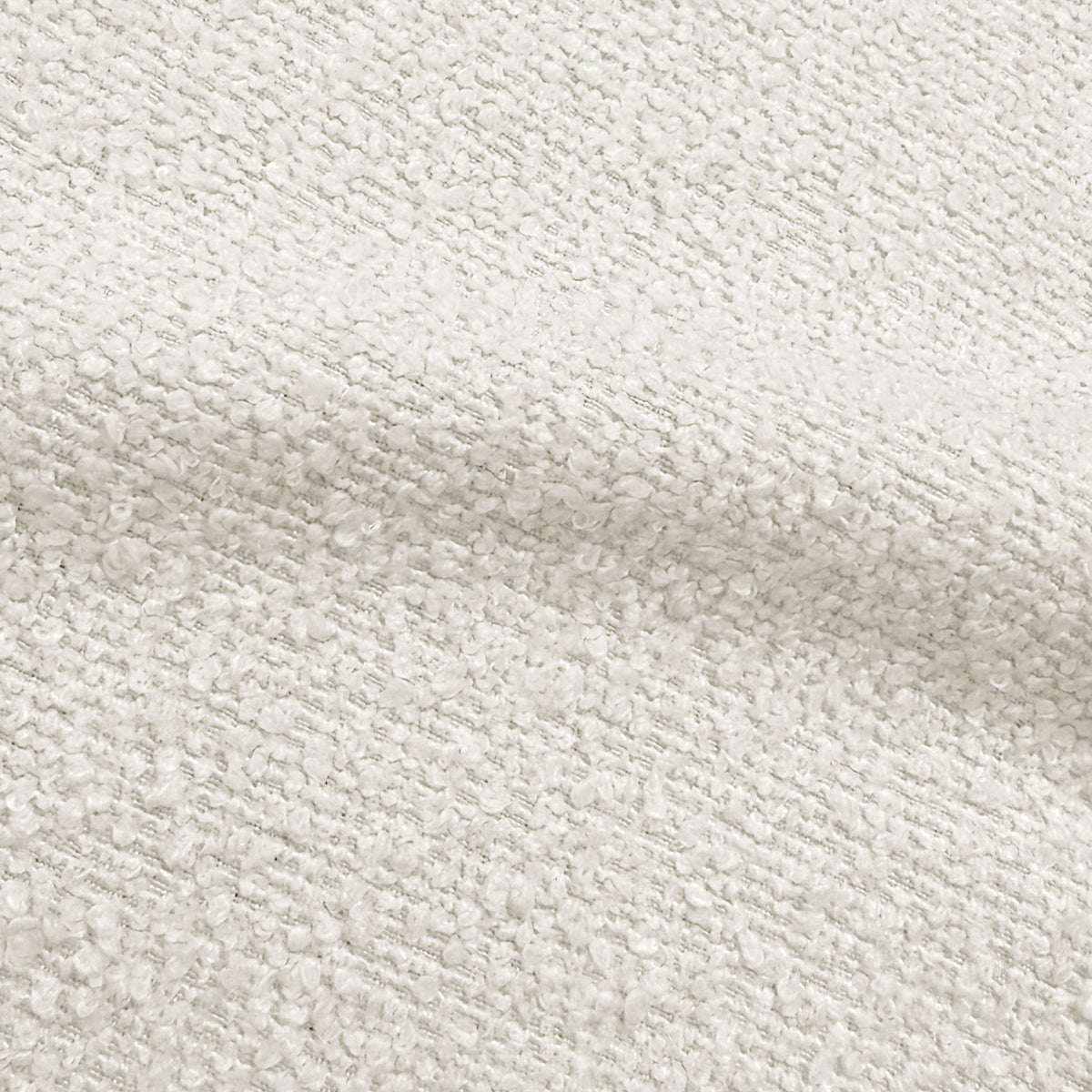 Close-up of cream white boucle fabric texture with woven pattern