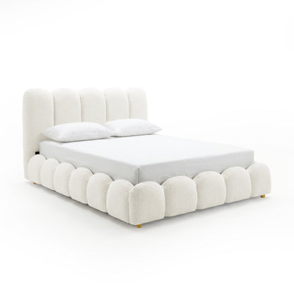 Brent double gas lift bed with boucle cream white upholstered headboard and scalloped base, shown with white bedding and gold