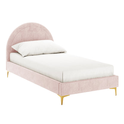 Camryn Kids Single Velvet Bed Frame in Soft Pink features a blush-pink velvet upholstery with a semi-arch headboard, low-profile rails, and slim gold-tone legs, complete with a white mattress and pillow.