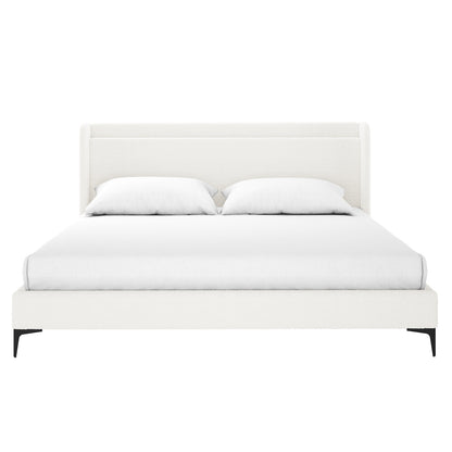Cream white boucle king bed frame with winged headboard, black legs, white bedding and two pillows