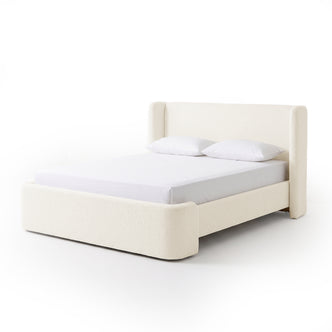 Full upholstered king bed on a white background
