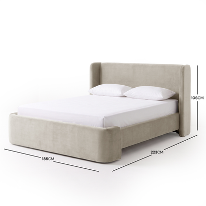 Full upholstered bed on white background with dimensions displayed