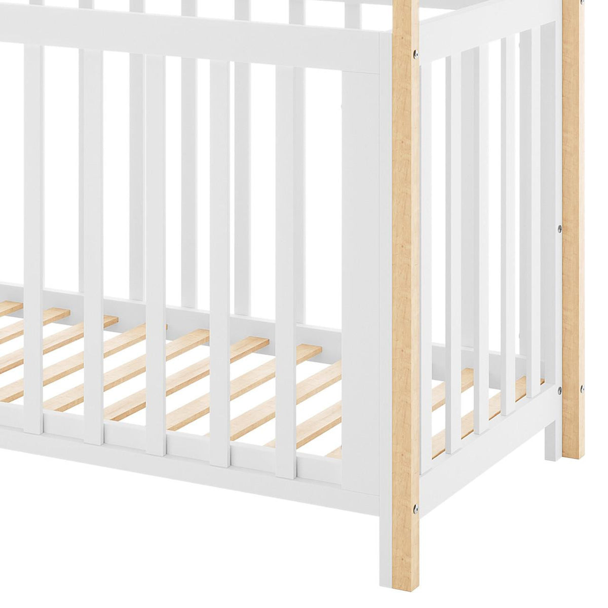 Damaris & Giro Solid Pine Baby Cot with Convertible Rail Set White features vertical white slatted side rails and natural wood-tone corner posts, showcasing a sturdy and stylish nursery solution.