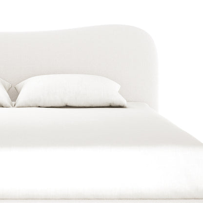 Ginnie Boucle Bed & Oriona Mattress - Super King, featuring a plush curved headboard in bouclé fabric and a thick, cool gel pocket spring mattress, displayed on a neatly made bed.