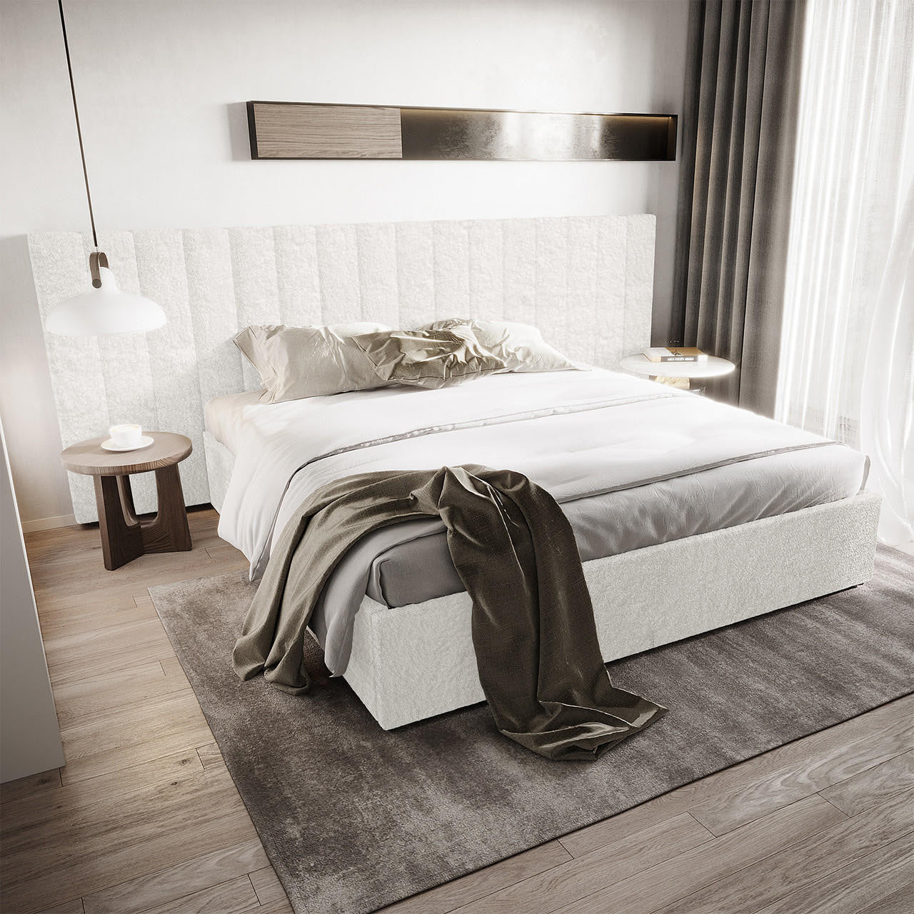Aquila King Extra Wide Bouclé Headboard in Cream White, upholstered in soft textured fabric, complements a modern bedroom setting with white bedding, neutral pillows, and minimalist décor elements like side tables and lighting.