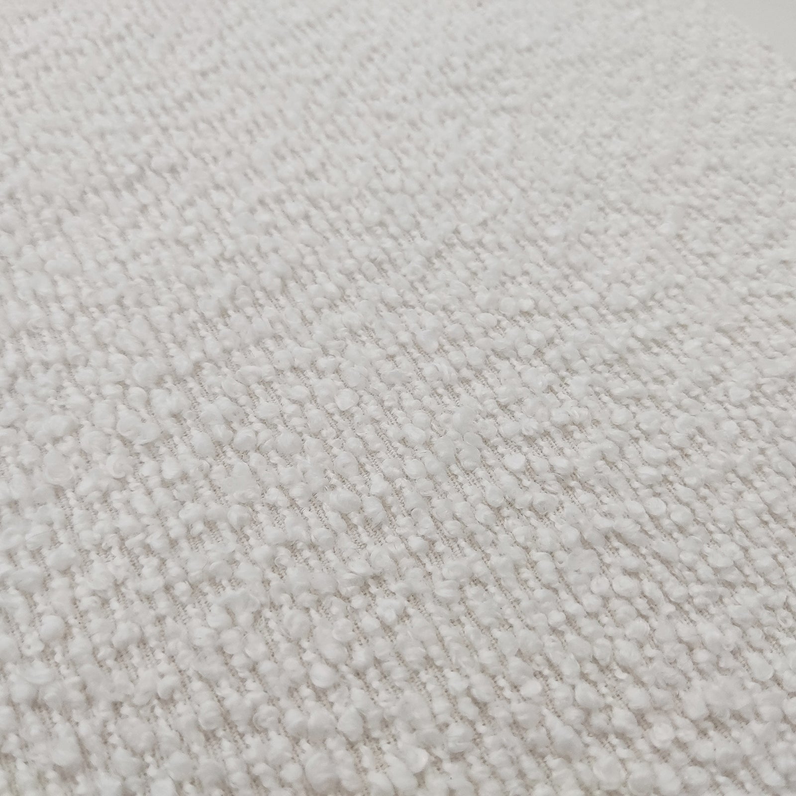 Harper Boucle Double Bed Frame in Eggshell White, featuring a close-up of its soft boucle fabric and timber accents, highlighting the modern and cozy design elements visible in the image.