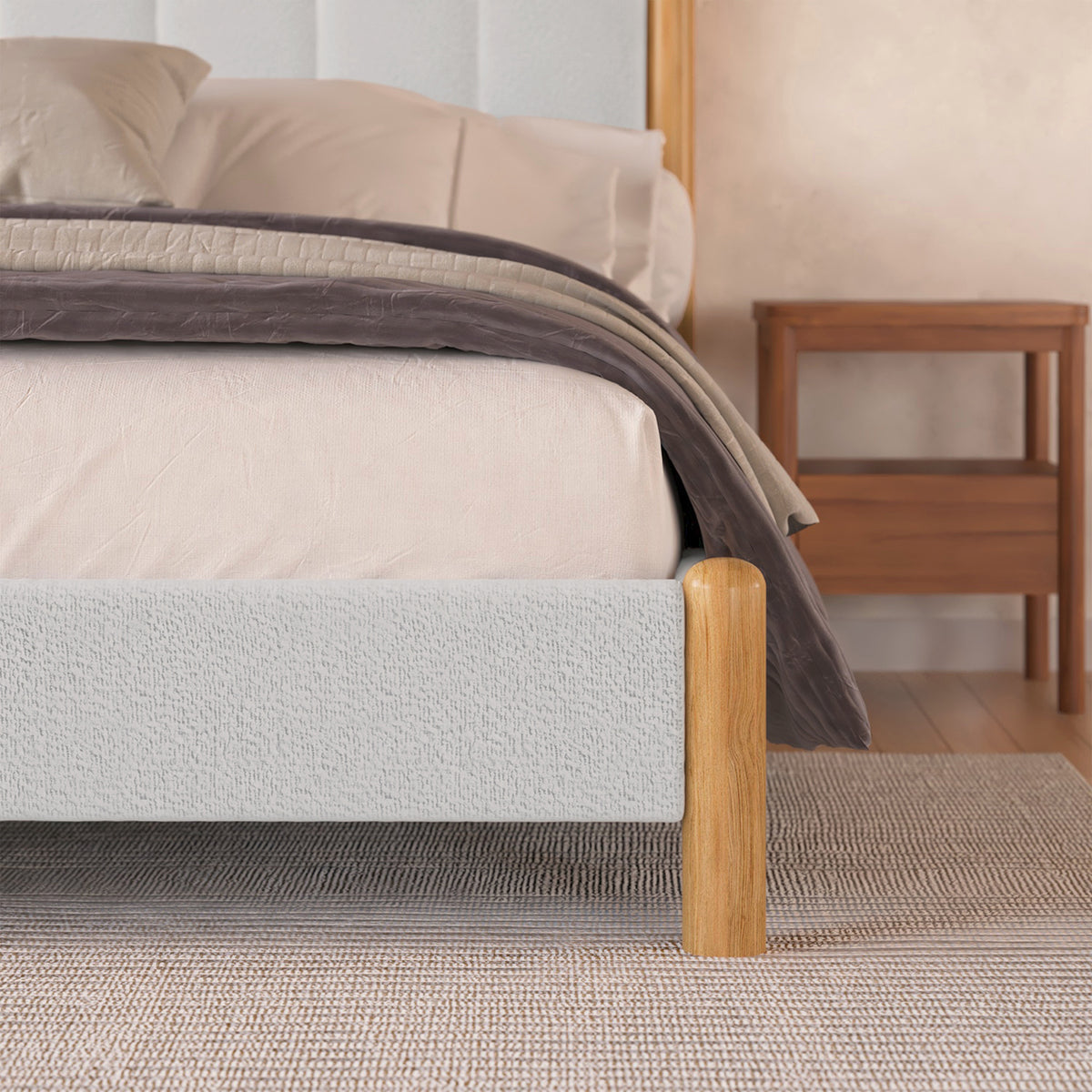 Harper Boucle King Bed Frame – Eggshell White, featuring a plush boucle surface, sturdy eucalyptus hardwood frame, and padded headboard, showcasing modern sophistication and durability in a close-up of the bed.