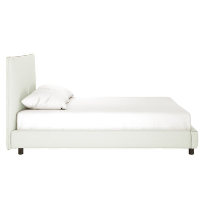 Havvan King Linen Upholstered Fabric Bed Frame - Off White, featuring a side view of a low, light frame with a tall, padded headboard, topped by a single pillow and neatly made mattress.