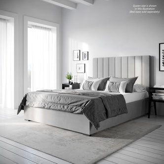 Gratiana Queen Velvet Fabric Headboard in Slate, featuring vertical channel tufting, plush velvet upholstery, and detailed stitching, shown in a minimalist bedroom setting with layered linens and simple black nightstands.