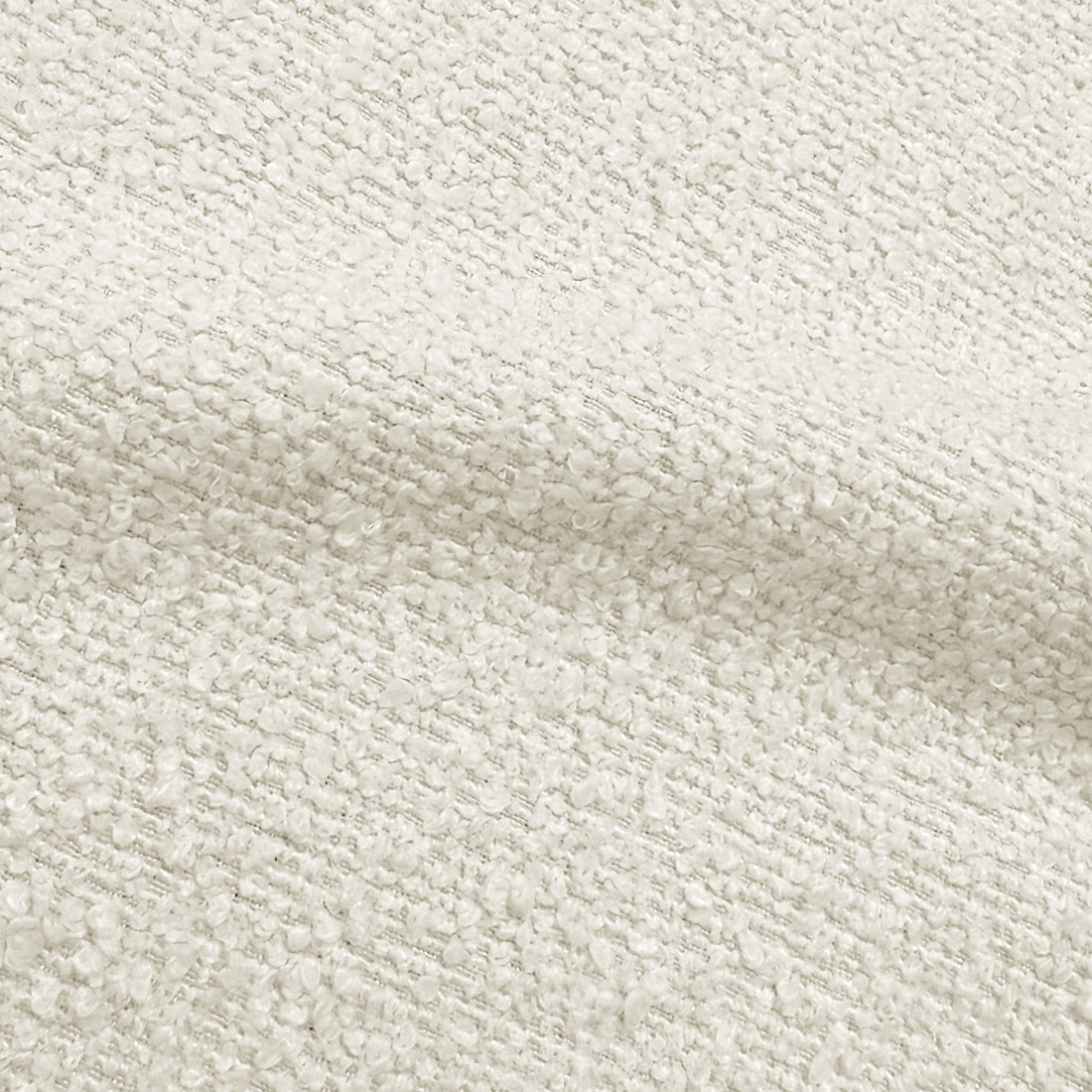 Close-up of cream white boucle fabric texture with woven looped pattern