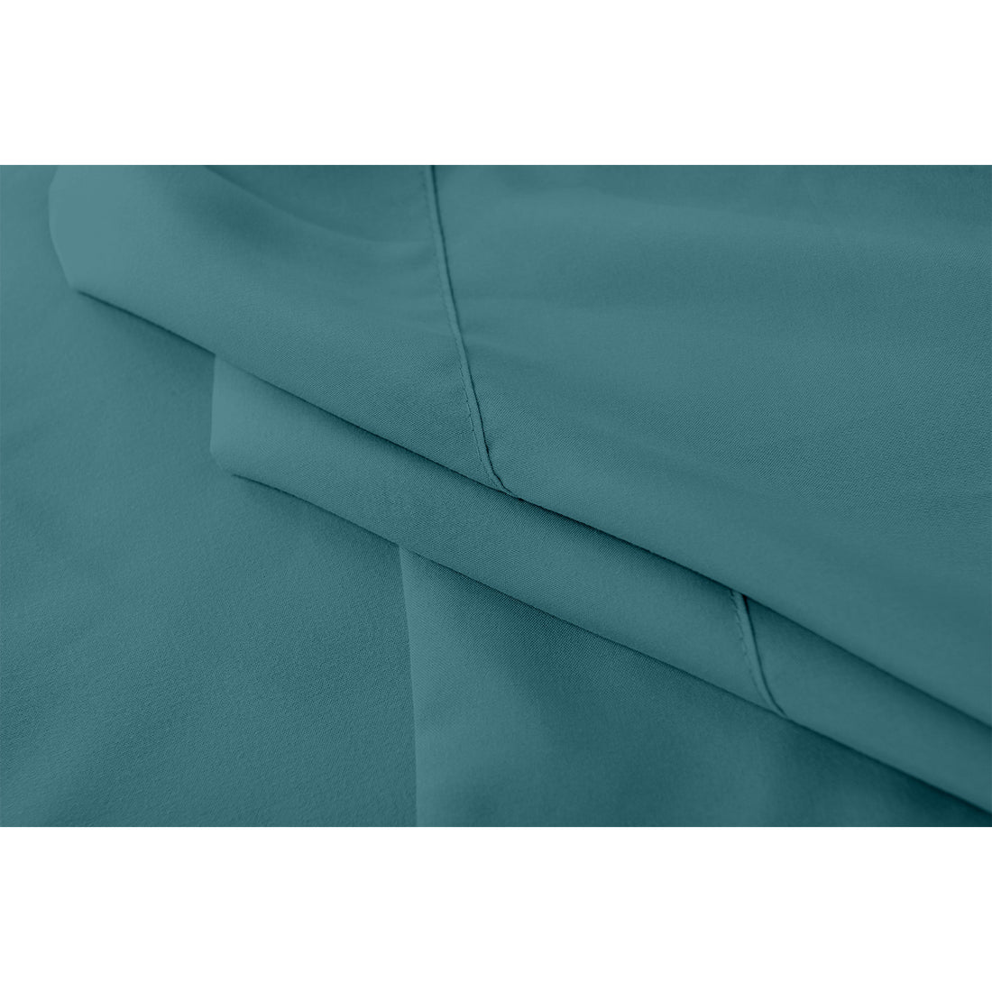 Close-up of Moroccan blue bed sheet set showing stitched seams and folded edges
