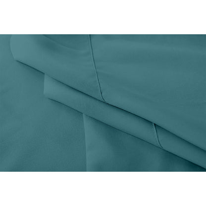 Close-up of Moroccan blue bed sheet set showing stitched seams and folded edges