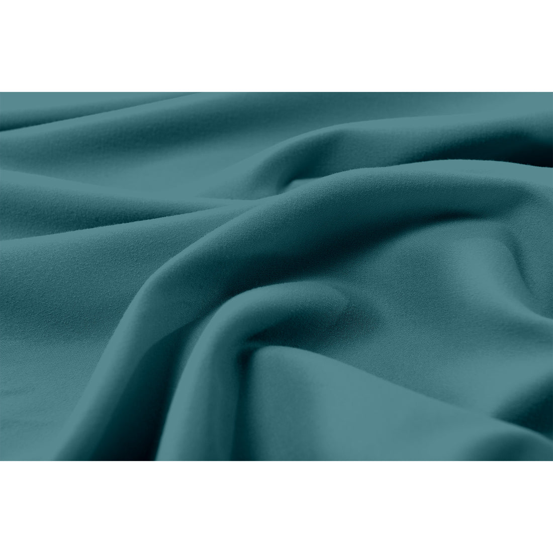 Close-up of Moroccan blue fabric with soft folds showing smooth texture