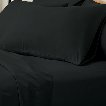 Valeria 1000TC Ultra Soft Bed Sheet Set Queen – Black displayed on a bed, showcasing smooth fabric and elegant drape, highlighting its luxurious and wrinkle-free appearance.