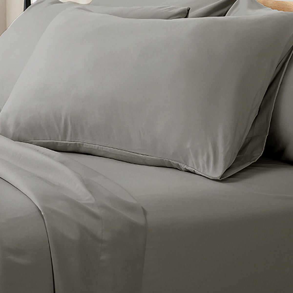 Close-up of grey Valeria 1000TC ultra soft bed sheet set in super king size, showing pillowcase and fitted sheet detail