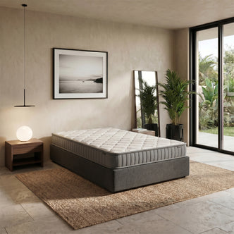 Asteria Single 18cm Latex Mattress with quilted white bamboo-print top and grey striped sides on dark grey upholstered base