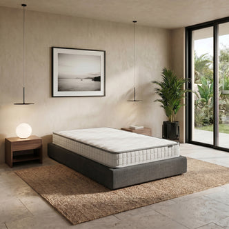 Cybele Single 20cm Pocket Spring Memory Foam Mattress on grey upholstered base in minimalist bedroom with pendant lighting