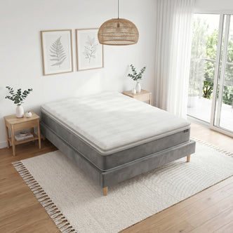 Delia King 28cm Medium Firm Euro Top Latex Mattress with plush white quilting on grey upholstered base, shown in a styled