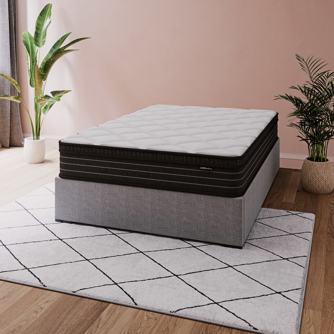 Iris Double Firm 25cm foam pillow top pocket spring mattress with quilted white top and black base on grey bed frame