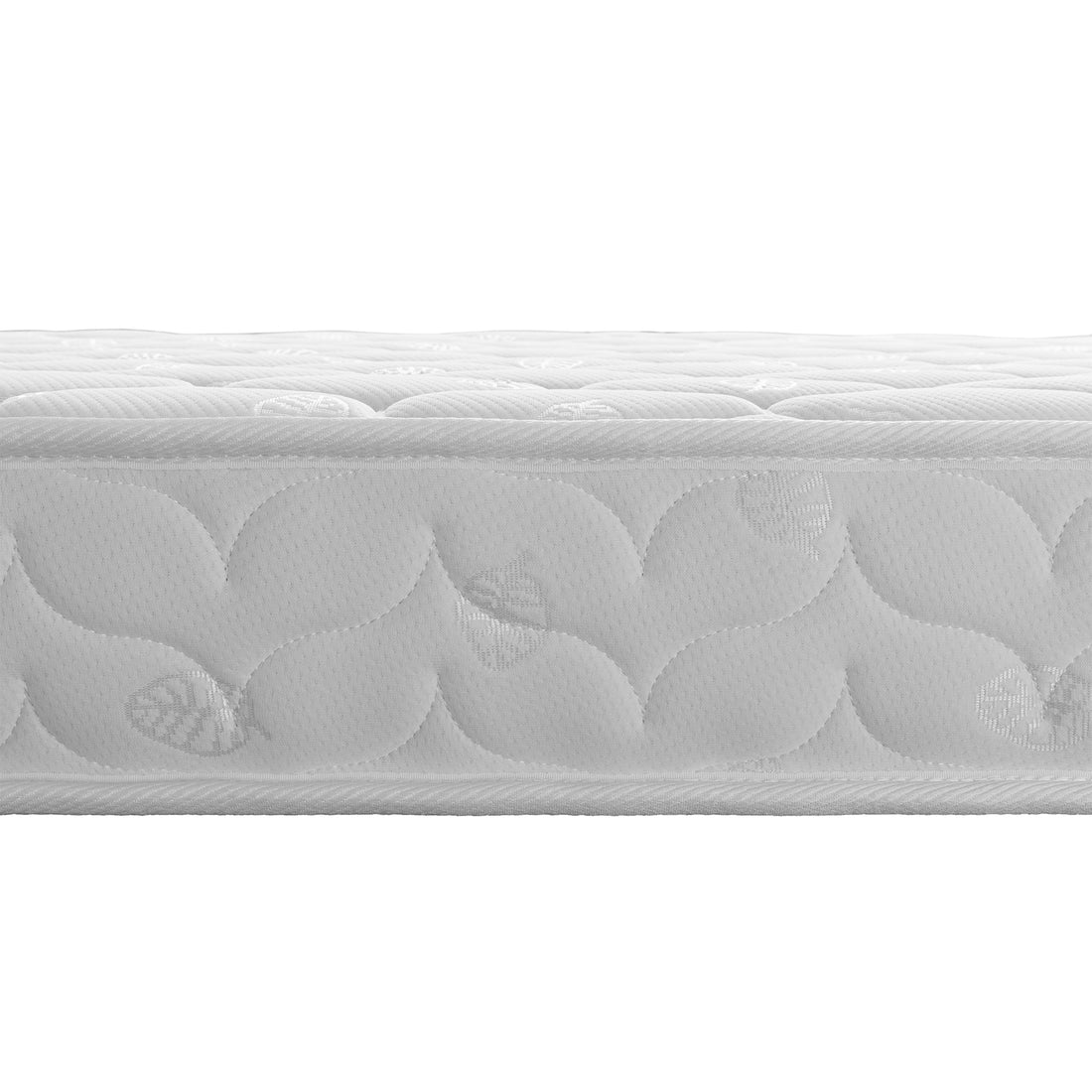 Close-up of the quilted damask-patterned Thermis Mattress atop the Momo Solid Pine Loft Bed, featuring a visible “Luxo Bedding” tag. The black foundation supports the mattress elegantly.