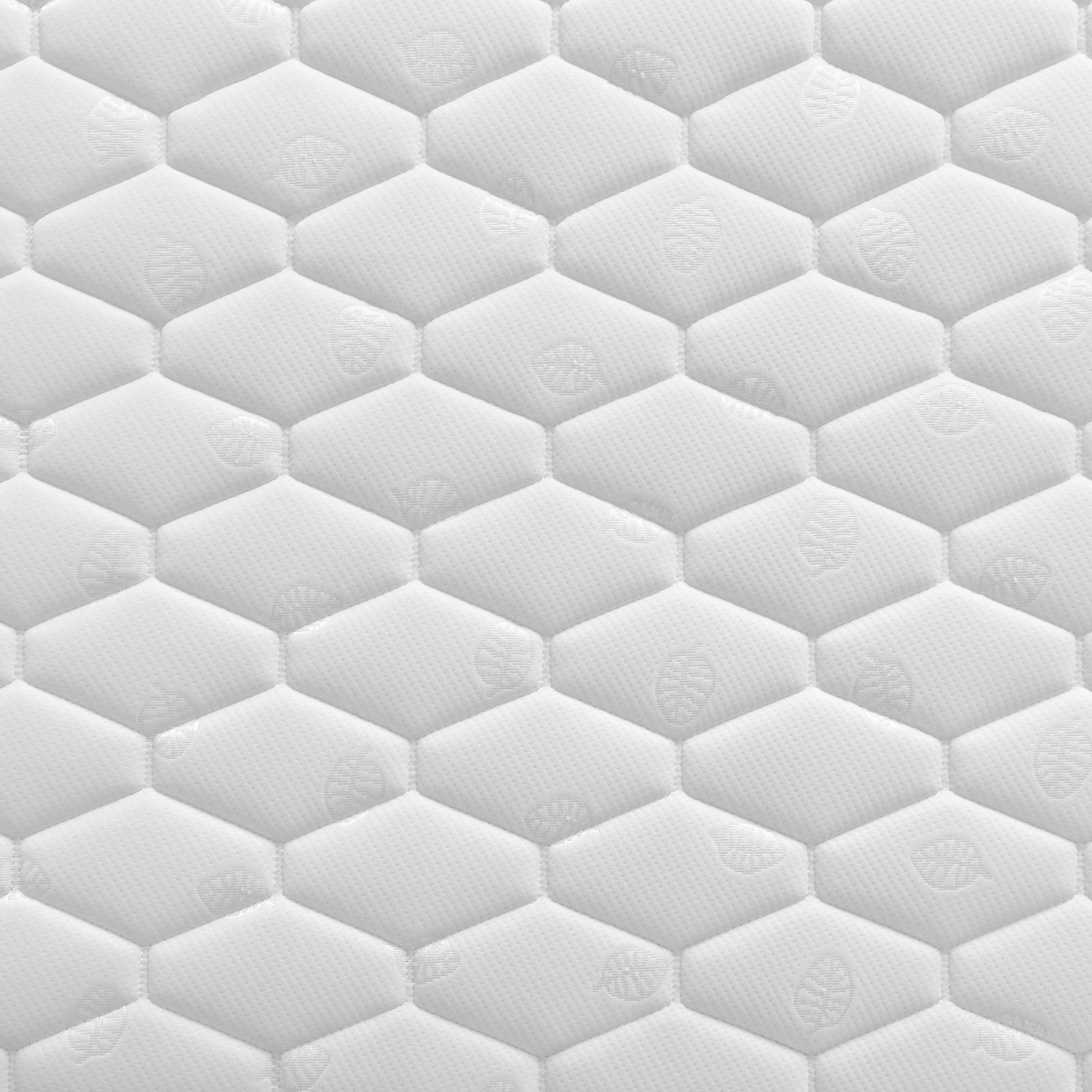 Close-up of the Momo Solid Pine Loft Bed with Thermis Mattress, showcasing quilted damask fabric, reinforced edge piping, and black upholstered base, emphasizing durability and style.