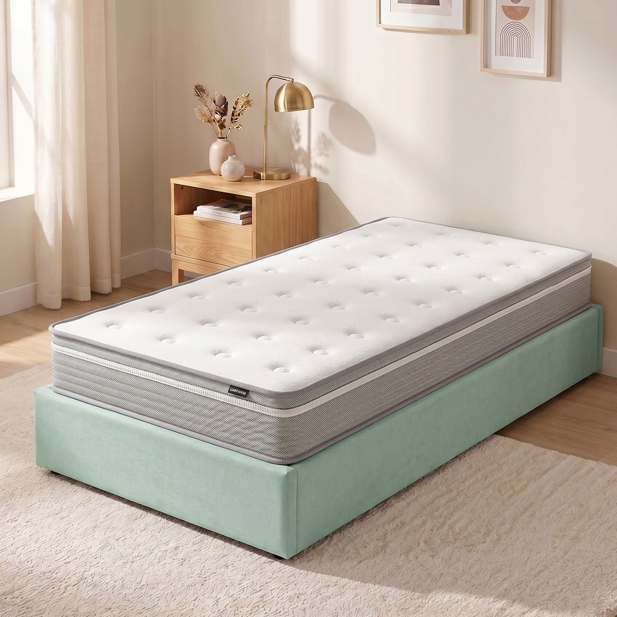 Oriona King Single 25cm Cool Gel Memory Foam Mattress in Medium Firm with tufted white top and grey sides on a mint green bed