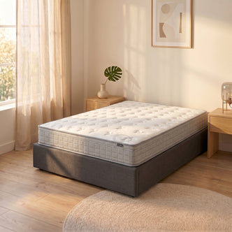 Thetis Queen 25cm Pocket Spring Latex Mattress in Med Firm with quilted white top, tufted pattern and light grey sides on a
