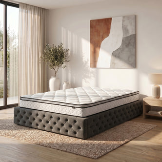 Luxo Venus Double Firm Pocket Spring Pillow Top Mattress with quilted white top layer and reinforced edges on grey tufted