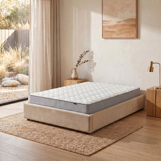 Vesta Double 20cm Medium Firm Pocket Spring Latex Mattress on beige upholstered bed base