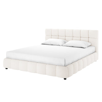Nikias King Boucle Fabric Bed Frame in Cream White features a tall, tufted headboard and plush, rounded base in off-white bouclé. The platform design includes a mattress with fitted sheet and pillows.