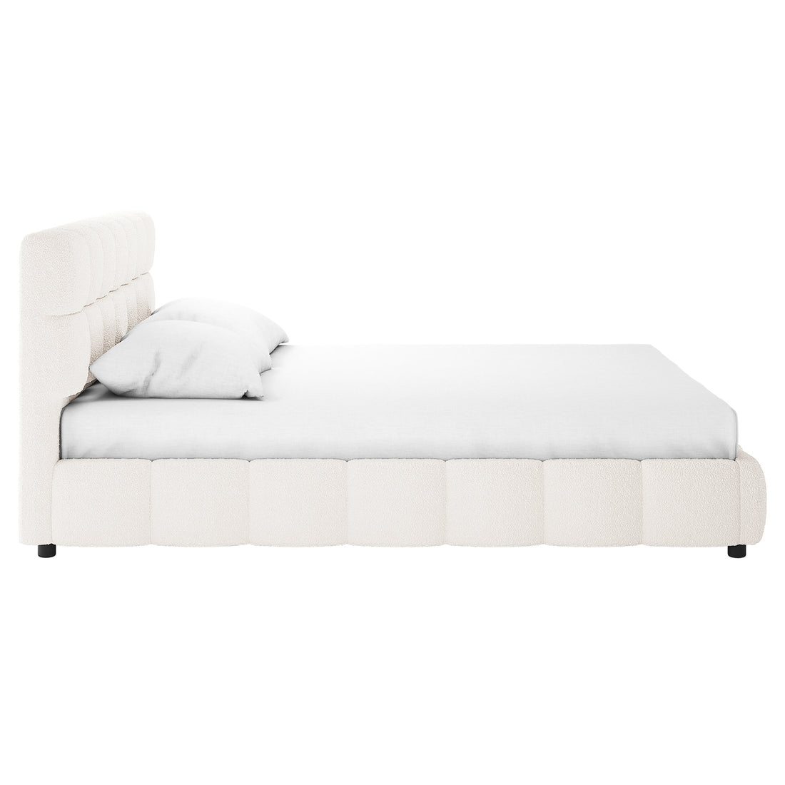 Nikias King Boucle Fabric Bed Frame in Cream White features a low-profile design with a plush, vertically channeled headboard, upholstered frame, and simple white bedding, showcasing modern elegance and comfort.