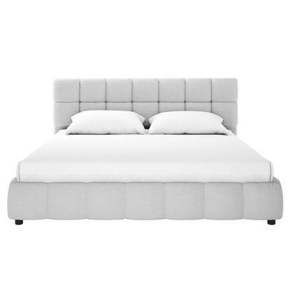 Nikias King Bouclé Fabric Bed Frame in Light Grey, featuring a plush, square-tufted headboard and footboard. The bed is adorned with white bedding and pillows, creating a modern and elegant look.