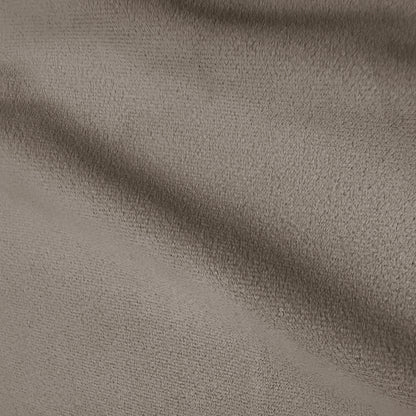 Warm grey velvet upholstered bed frame close-up showing textured fabric detail