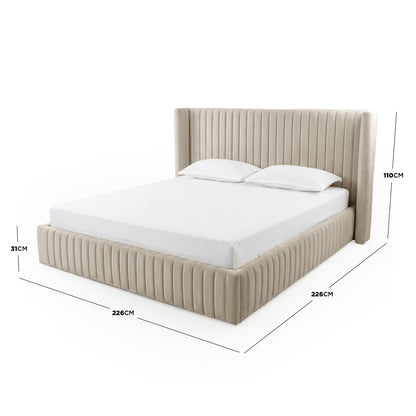 Warm grey velvet king bed frame with vertical channel tufting, gas lift storage base, dimensions 226cm x 226cm x 110cm, shown