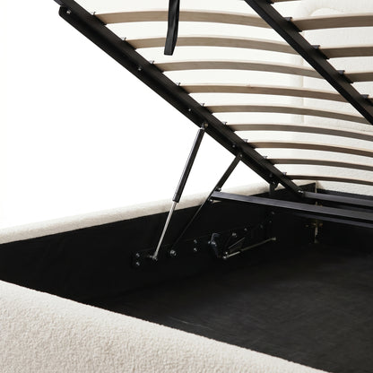 Cream boucle upholstered king bed frame with gas lift storage mechanism and wooden slats shown in open position