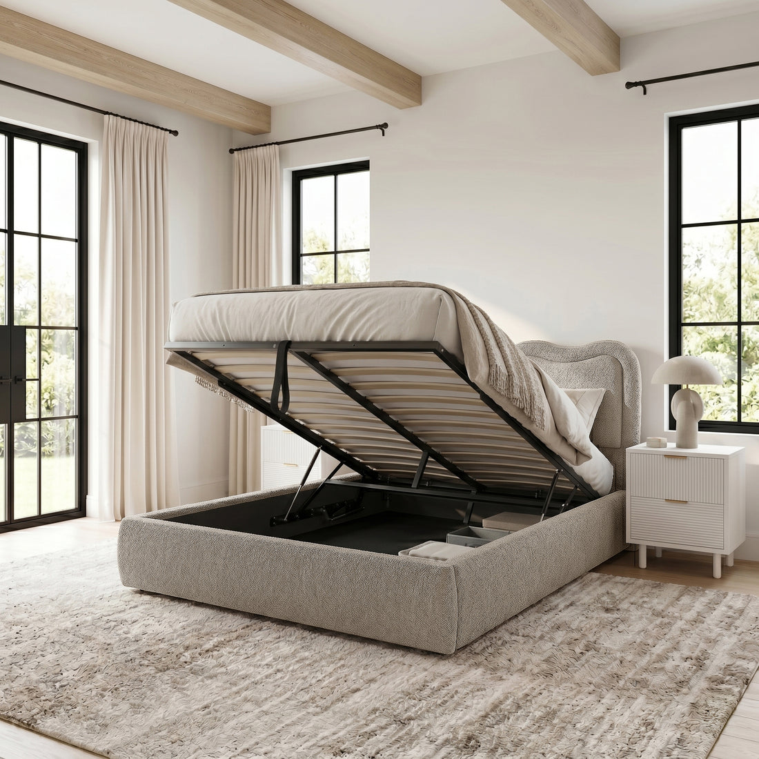 Noemi Queen Boucle Gas Lift Storage Bed in Beige with mattress base lifted to reveal under-bed storage compartment.