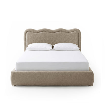 Beige boucle upholstered queen bed with scalloped headboard and gas lift storage base, shown with white mattress and two