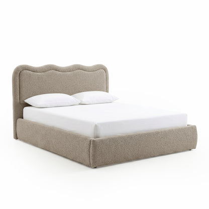 Beige boucle upholstered queen bed with curved scalloped headboard and gas lift storage base