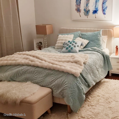 Seneca Double Upholstered Velvet Bed – Sandy White with channel-tufted headboard and footboard, tapered wooden legs, styled