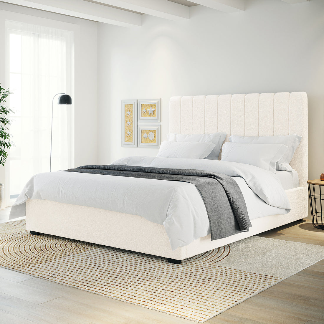 Septima & Gratiana King Bed Base & Headboard in Cream White, featuring a plush, channel-stitched headboard and soft ivory fabric, complemented by crisp white bedding, a charcoal throw, and a modern minimalist bedroom setting.
