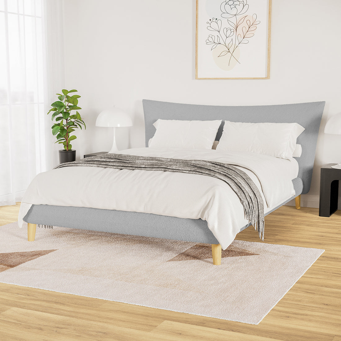 Silvina Queen Upholstered Boucle Bed in Light Grey centered in a minimalist bedroom, showcasing its grey fabric, wooden legs, and puffy headboard, complemented by white bedding and a light grey throw.