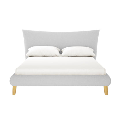 Silvina Upholstered Boucle Bed - Queen - Light Grey with a flared, textured headboard, low-profile frame, and tapered wooden legs. Includes a white mattress cover and pillows against a plain backdrop.