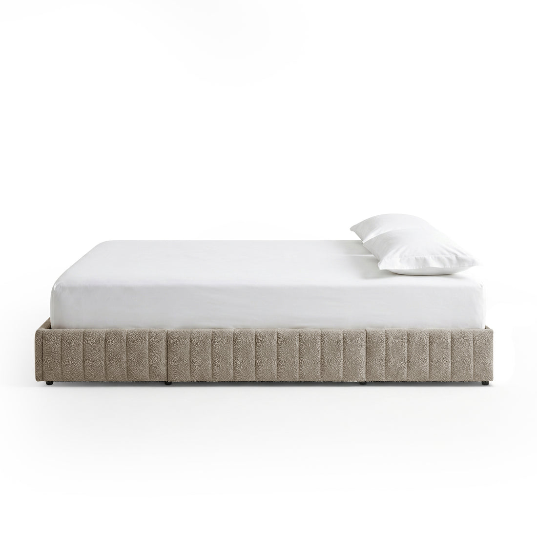Solin King fluted storage bed base in warm beige boucle with white mattress and pillow