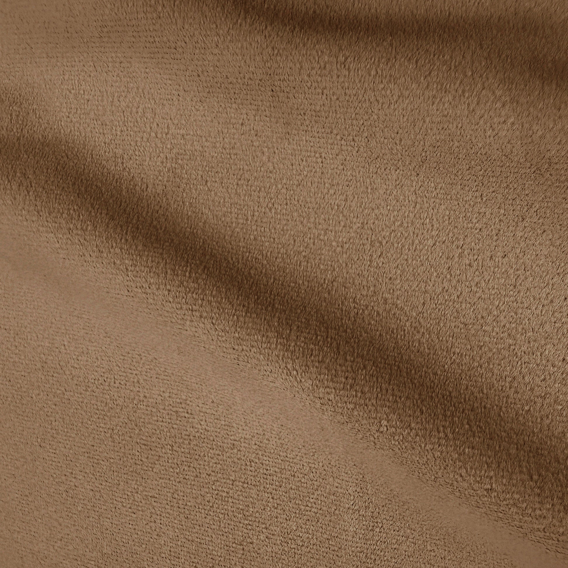 Close-up of mocha brown textured upholstery fabric showing tonal colour variations