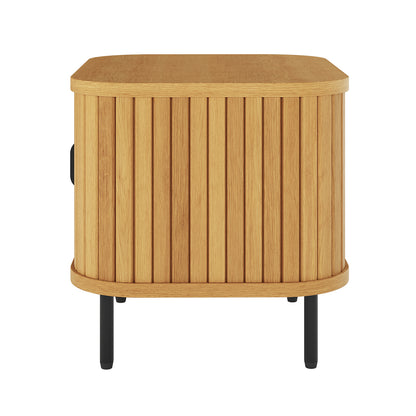 Aaron 50cm Bedside Table with Sliding Doors - Natural features a compact design with a light-toned tambour front, sleek black metal legs, and a flat top for modern bedroom storage.