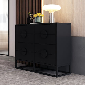 Abigail 120cm Lowboy Dresser with Drawers - Black shown with six drawers, a matte-black finish, and set on an open metal base. Topped with vases and a lamp.